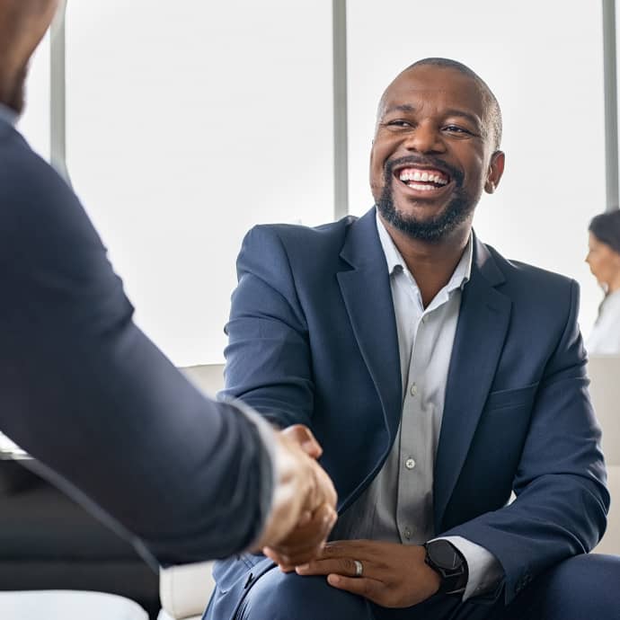 Man in Suit Shaking Hand